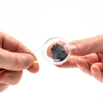 Collection of 20 rocks and minerals with magnifying glasses